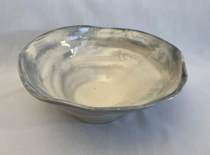 Organically flowing low bowl