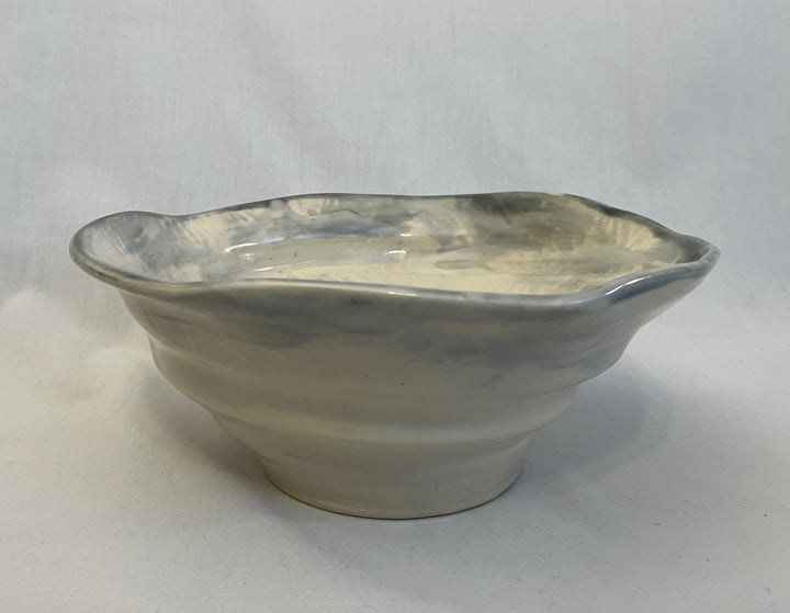 Organically flowing low bowl