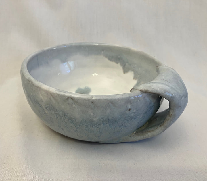 Small bowl with fish tail handle